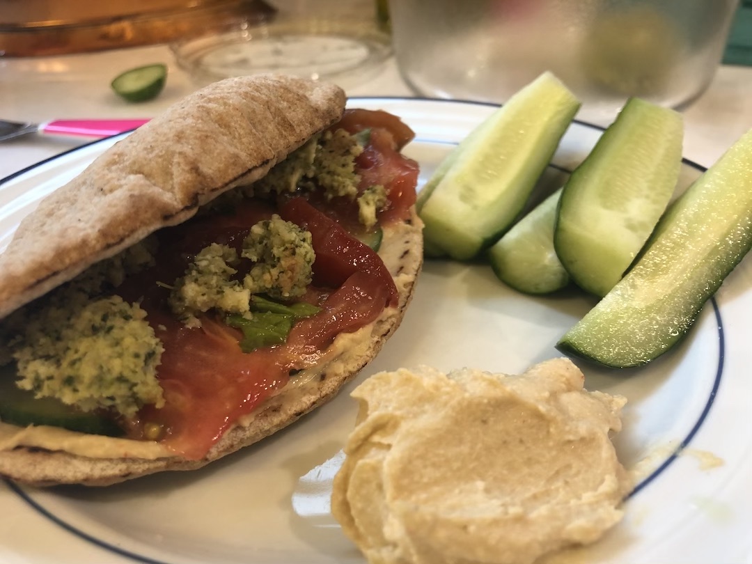 Pita Bread Sandwhich with Hummus, Cucumber, and Heirloom Tomatoes